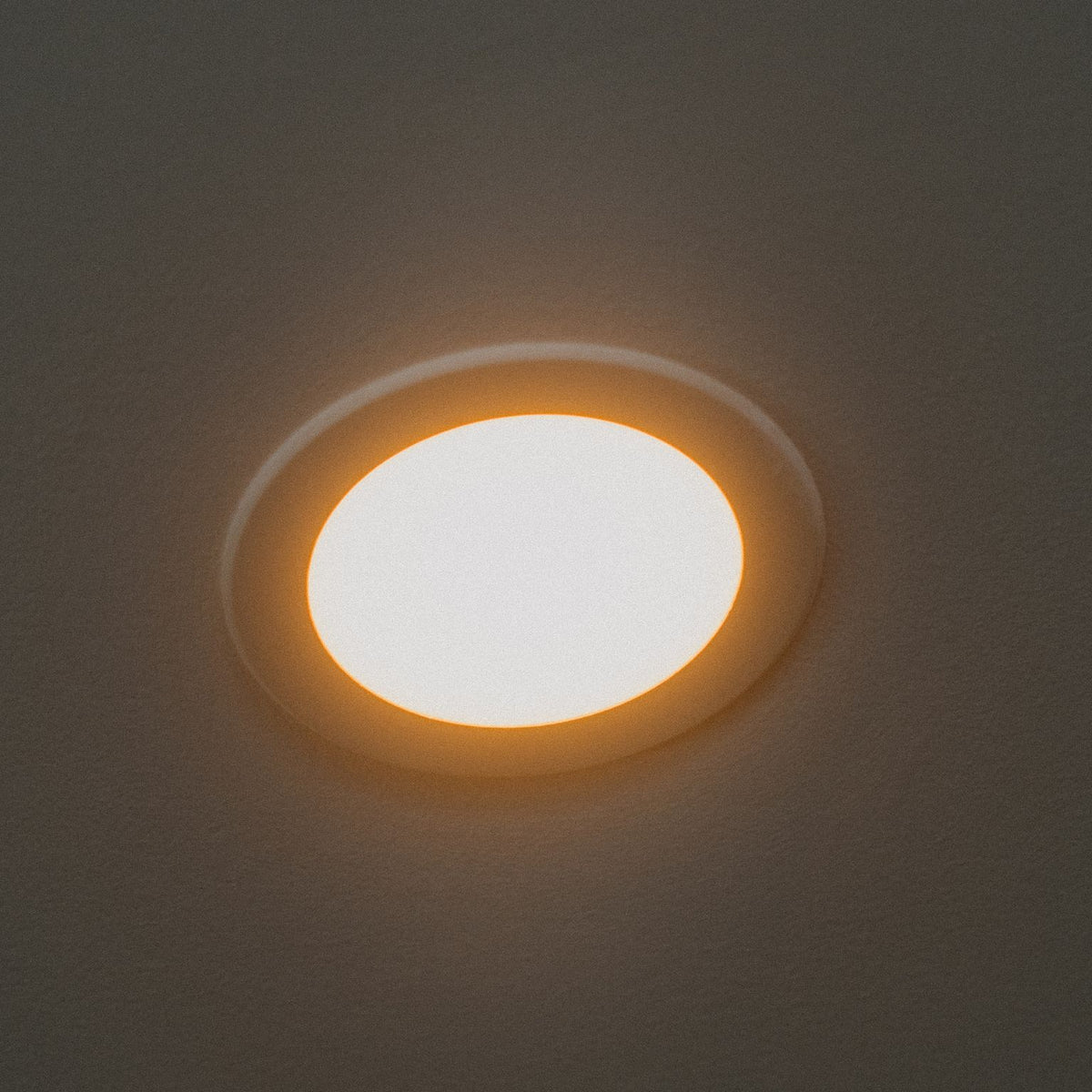 LUM8 Circadian Downlight in modern kitchen — three circadian lighting modes for daily rhythm
