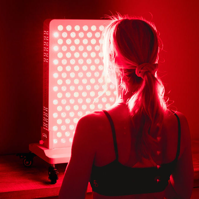 LUM8 RLP 200 MAX in use — red and near-infrared light therapy at home