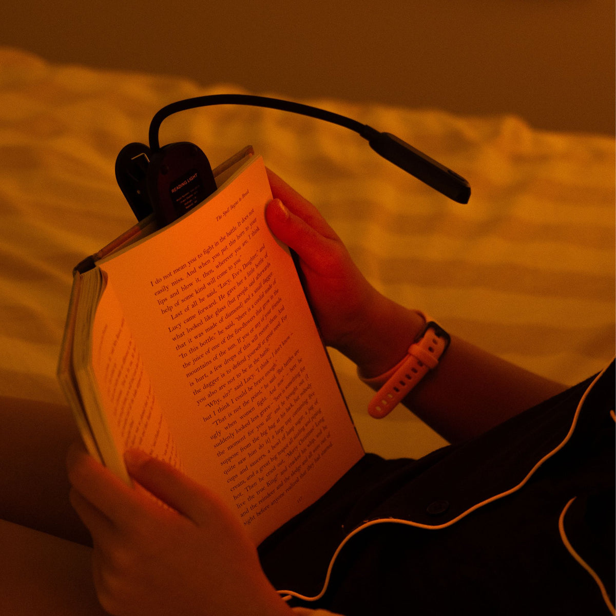 LUM8 Wind Down Reading Light LED strip glowing warm amber — zero blue light reading light